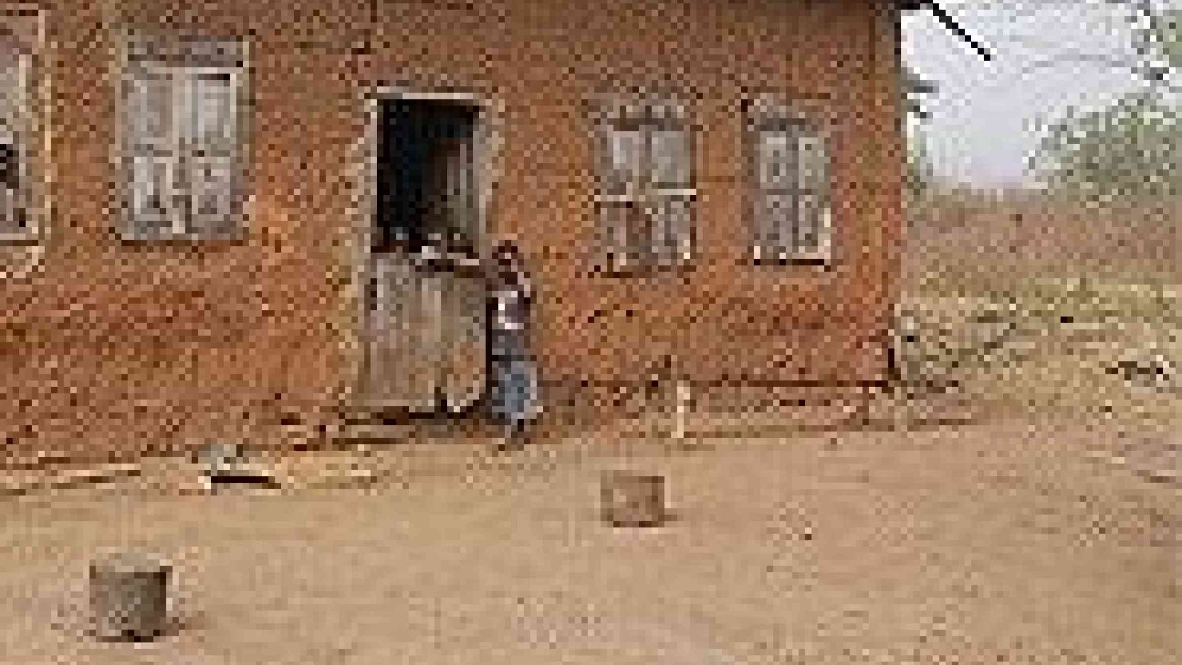 Photo of children in front of a mud house in Nigeria by Flickr user, IITA image library, Creative Commons Attribution 2.0 Generic (CC BY 2.0)