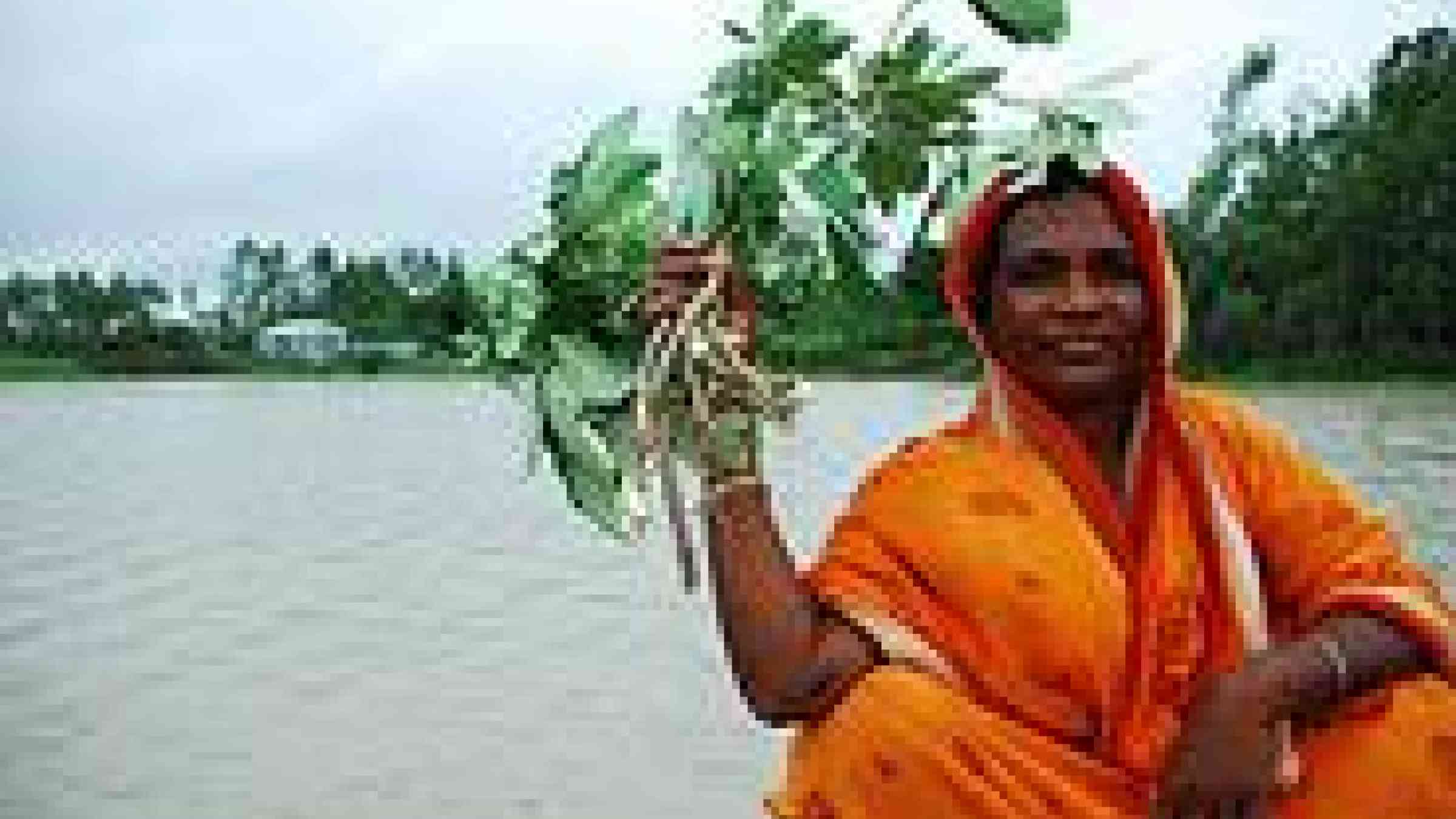 Bangladeshi woman speaks of regular flooding, photo byflickr user amirjina, CC BY-NC-ND 2.0 http://www.flickr.com/photos/amirjina/3747902139/sizes/l/in/photostream/