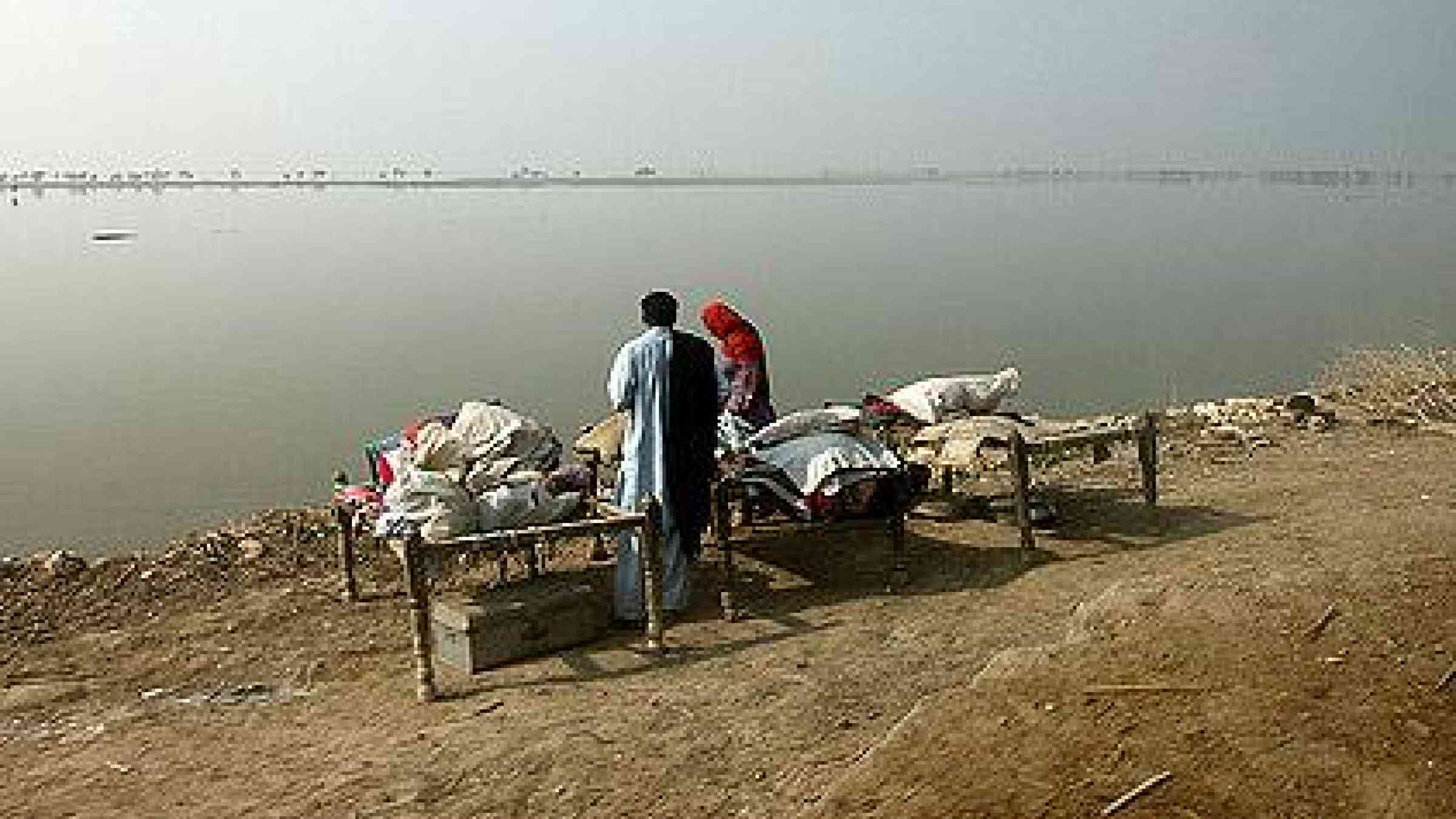 Families returning to their communities following the flooding in Pakistan are often being forced to camp by the roadside, as the flood waters have still not receded sufficiently for them to return to their homes.  Image: DFID/Russell Watkins