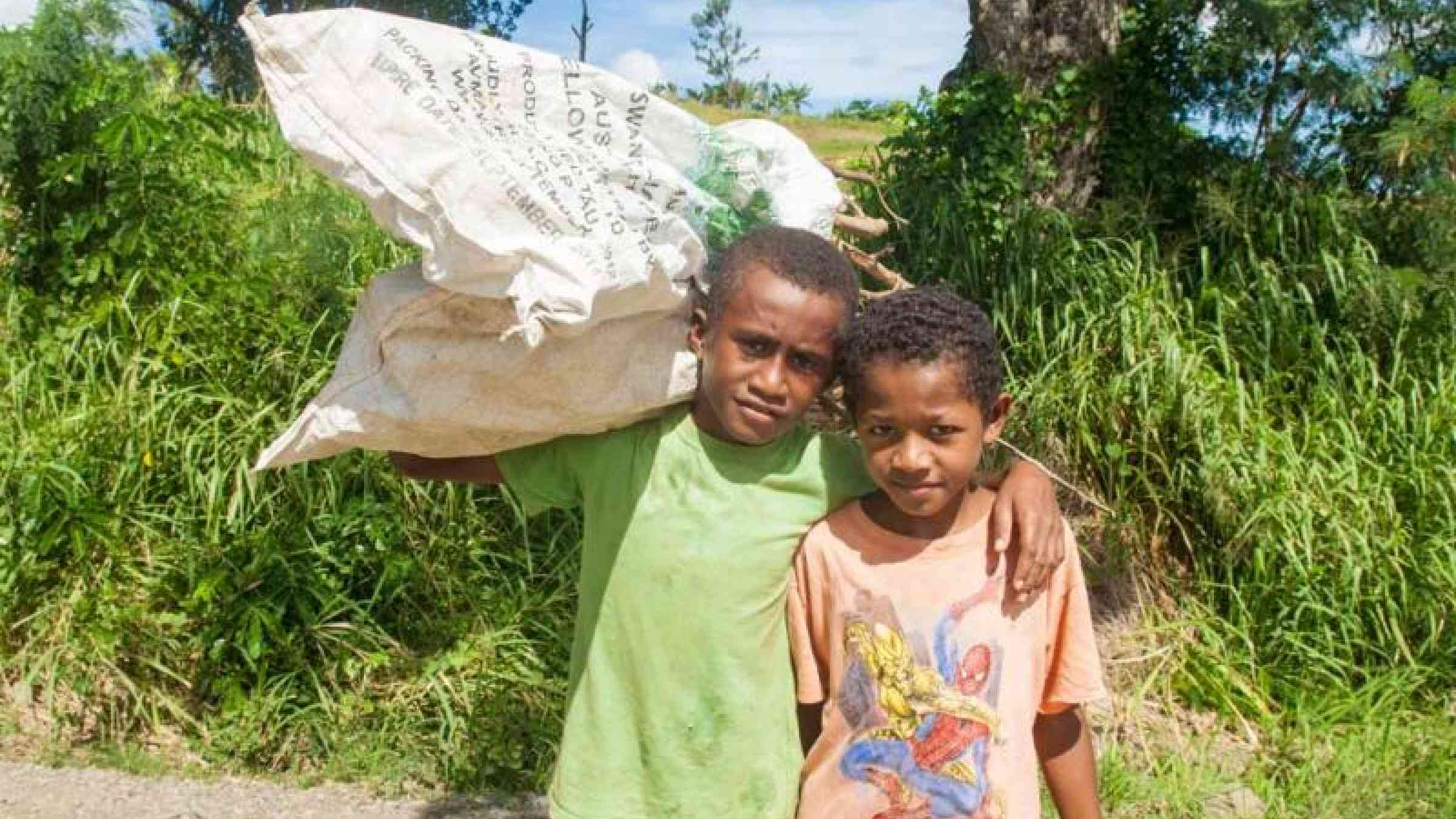 The long view: Dr Jimmie Rodgers is looking 50 years ahead to secure the future for youngsters such as these in Nagando Village, Fiji. (Photo: Sean Hobbs/Secretariat of the Pacific Community)