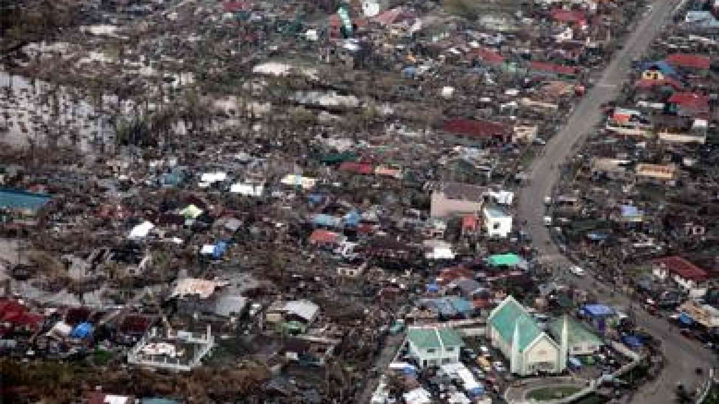 Aerial view of Tacloban after Typhoon Haiyan by DFID https://www.flickr.com/photos/dfid/11043346434 CC BY 2.0
