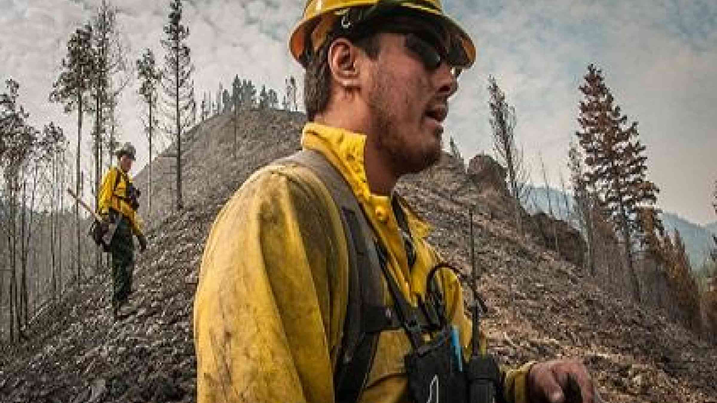 Trainee Bobby Robedeaux, of a fire fighting squad of the Pawnee, Ponca and Otoe tribes, traverses a burned out hillside, looking for hotspots, in Hailey, Idaho, in 2013. (Photo: USDA/Lance Cheung)