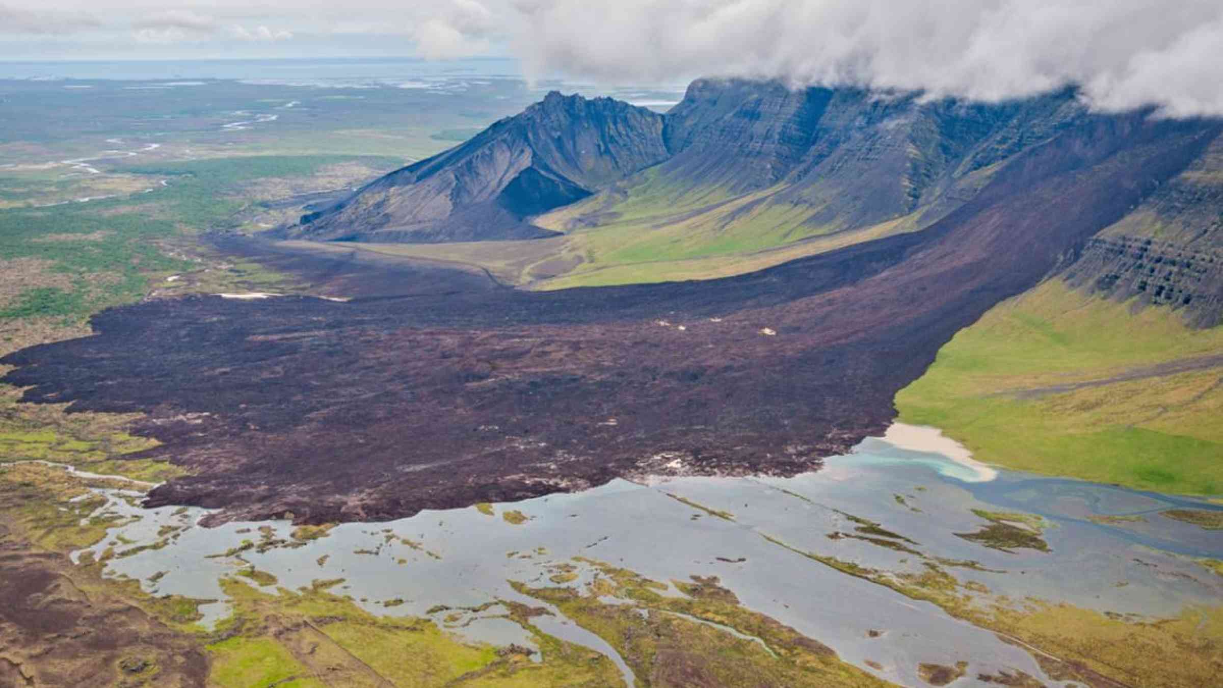 The impact of a landslide in the Hítardalur valley, Iceland in 2018. Miks Mihails Ignats/Shutterstock