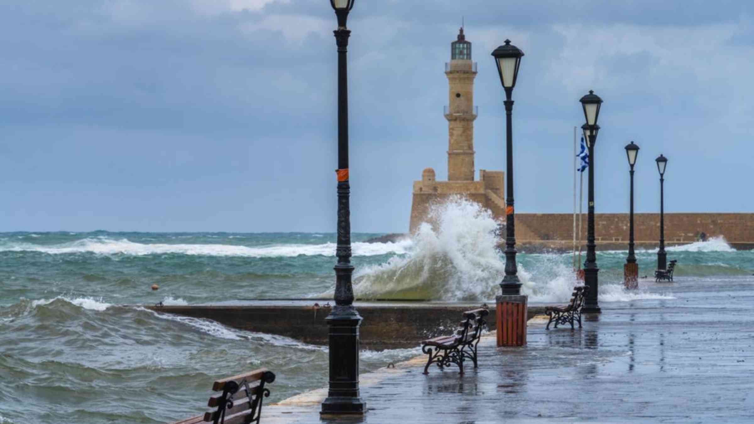 Storm surge in Chania, Greece. LouieLea/Shutterstock