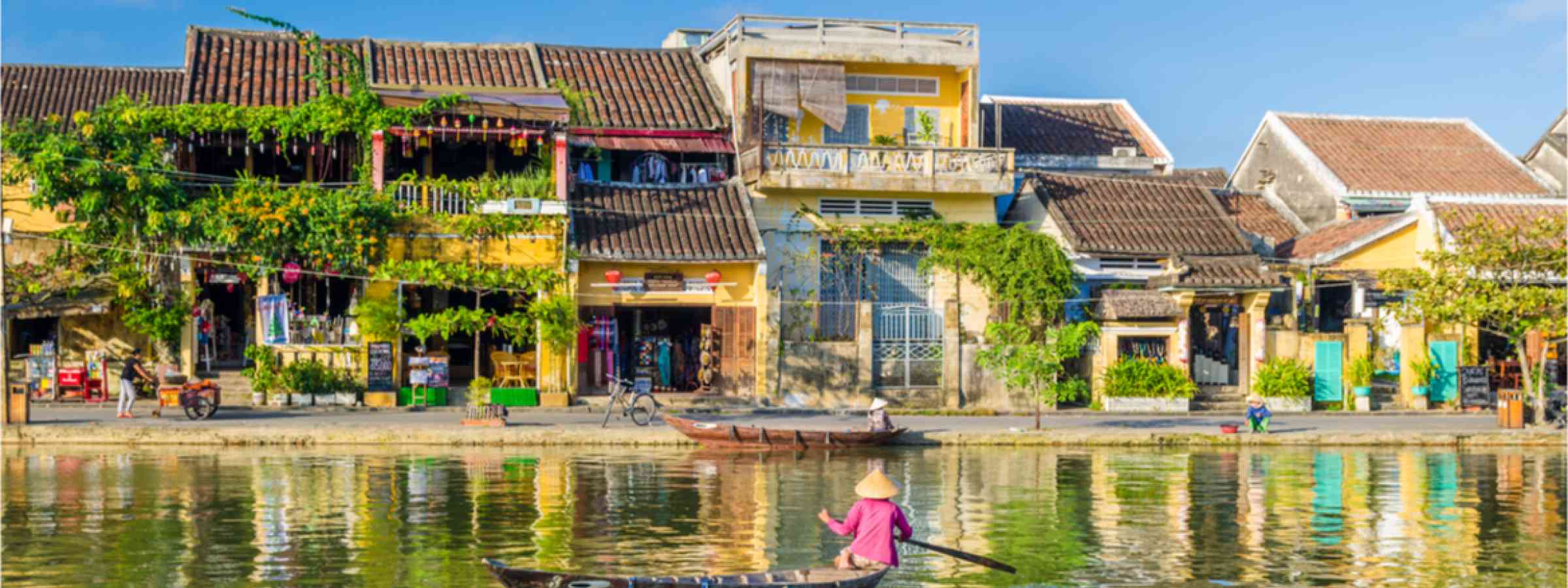 A women on a float on the river in Hoi An in Vietnam.