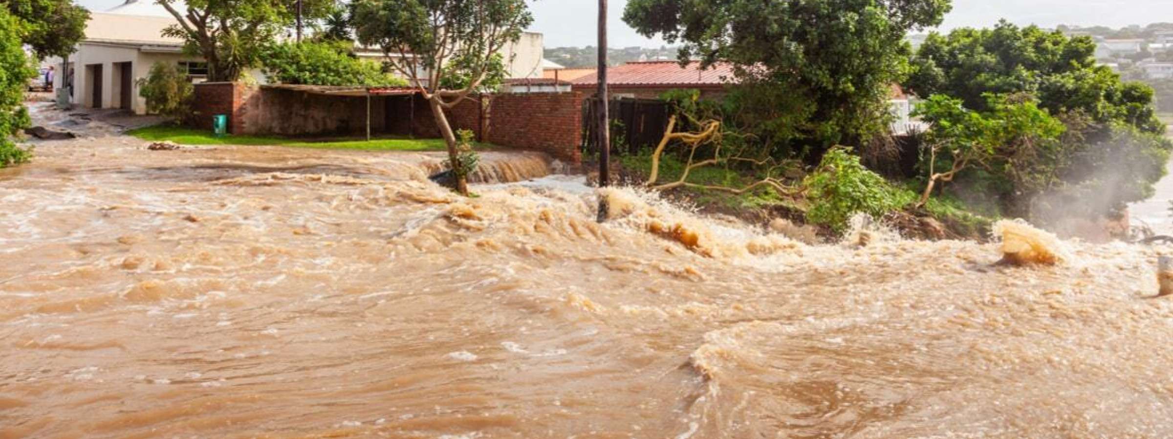 Flooded street and house in Eastern South Africa